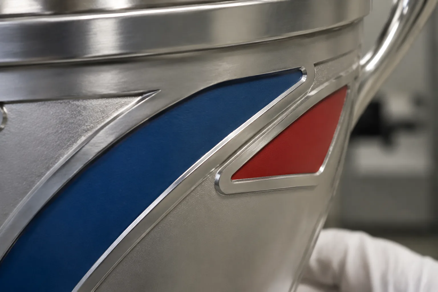 Close-up of painted details on a metal trophy