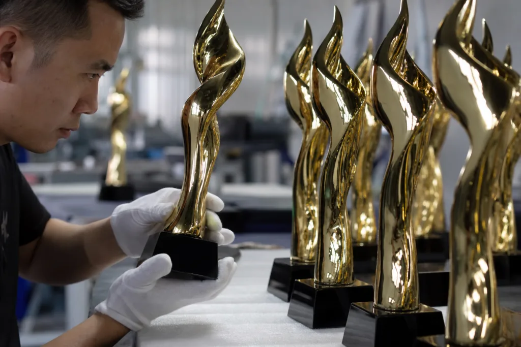 Die Casting Design Guidelines for Detailed Metal Trophies 3 Finished plated metal trophies inspected during sample production and quality control